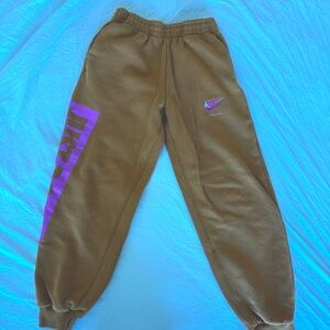 Nike Kids Mustard Joggers with Purple Accents